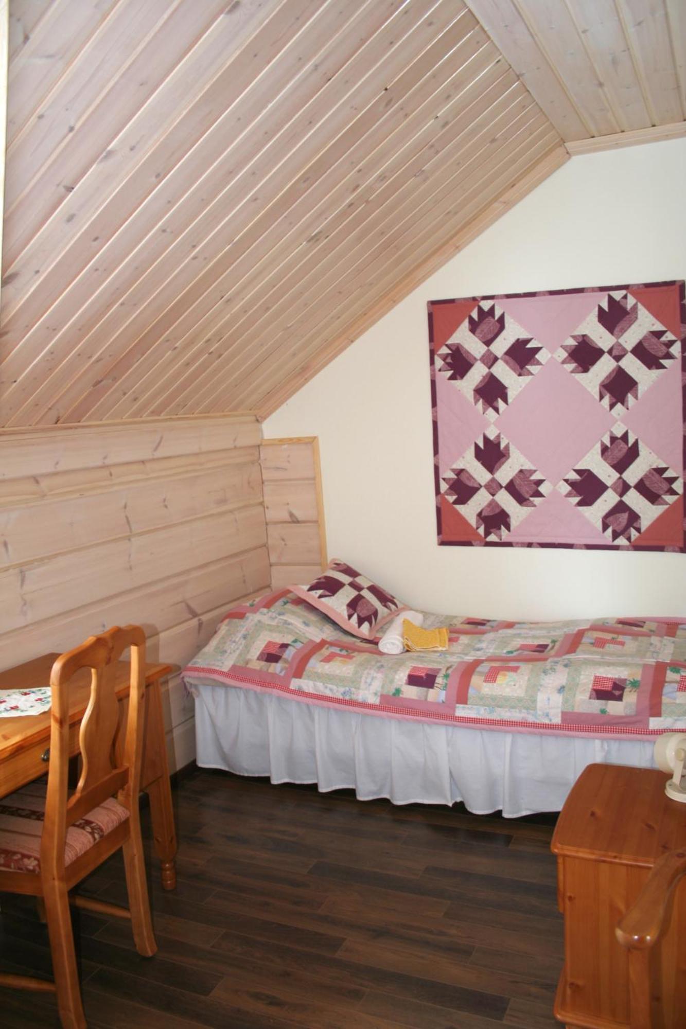 Guest House Haapaniemen Hirsikartano Иисалми Экстерьер фото
