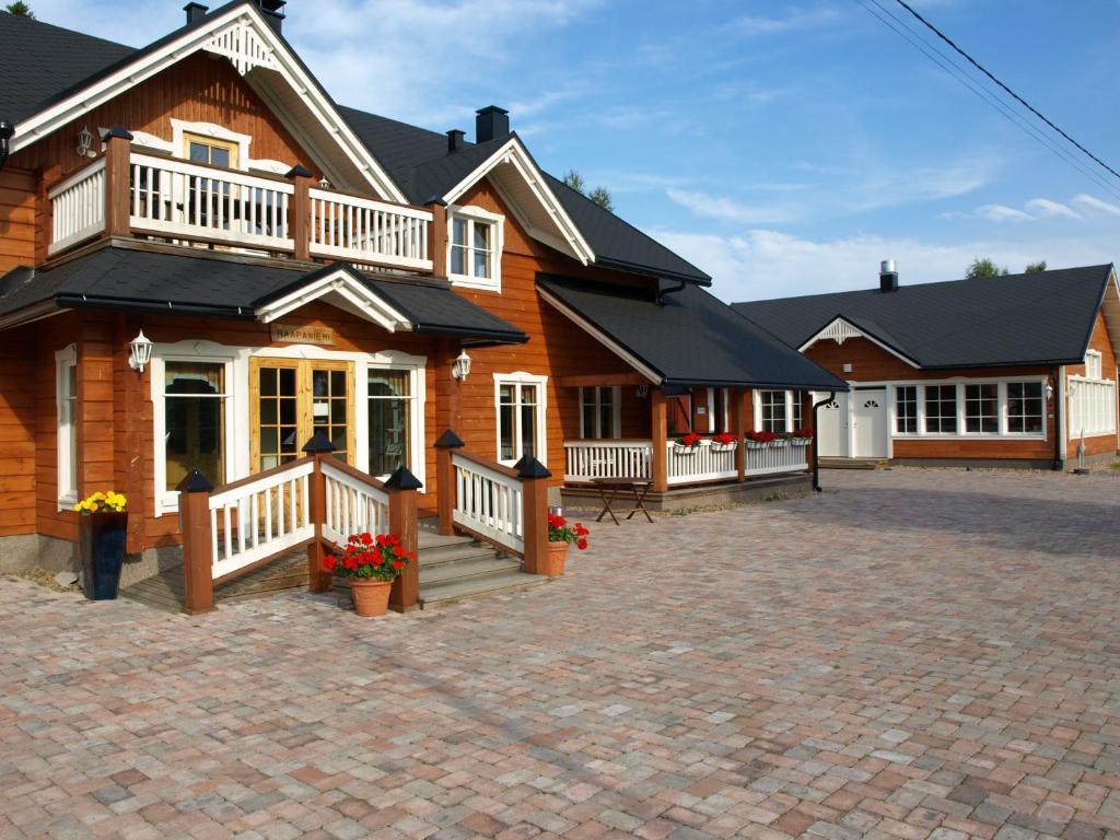 Guest House Haapaniemen Hirsikartano Иисалми Экстерьер фото